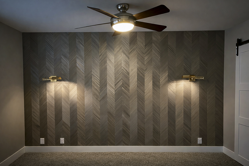 Empty room with striped accent wall and ceiling fan installation, Denver home